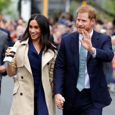 melbourne, australia october 18 prince harry, duke of sussex and meghan, duchess of sussex wave to the crowd as they arrive at the royal botanic gardens on october 18, 2018 in melbourne, australia the duke and duchess of sussex are on their official 16 day autumn tour visiting cities in australia, fiji, tonga and new zealand photo by phil noble poolgetty images