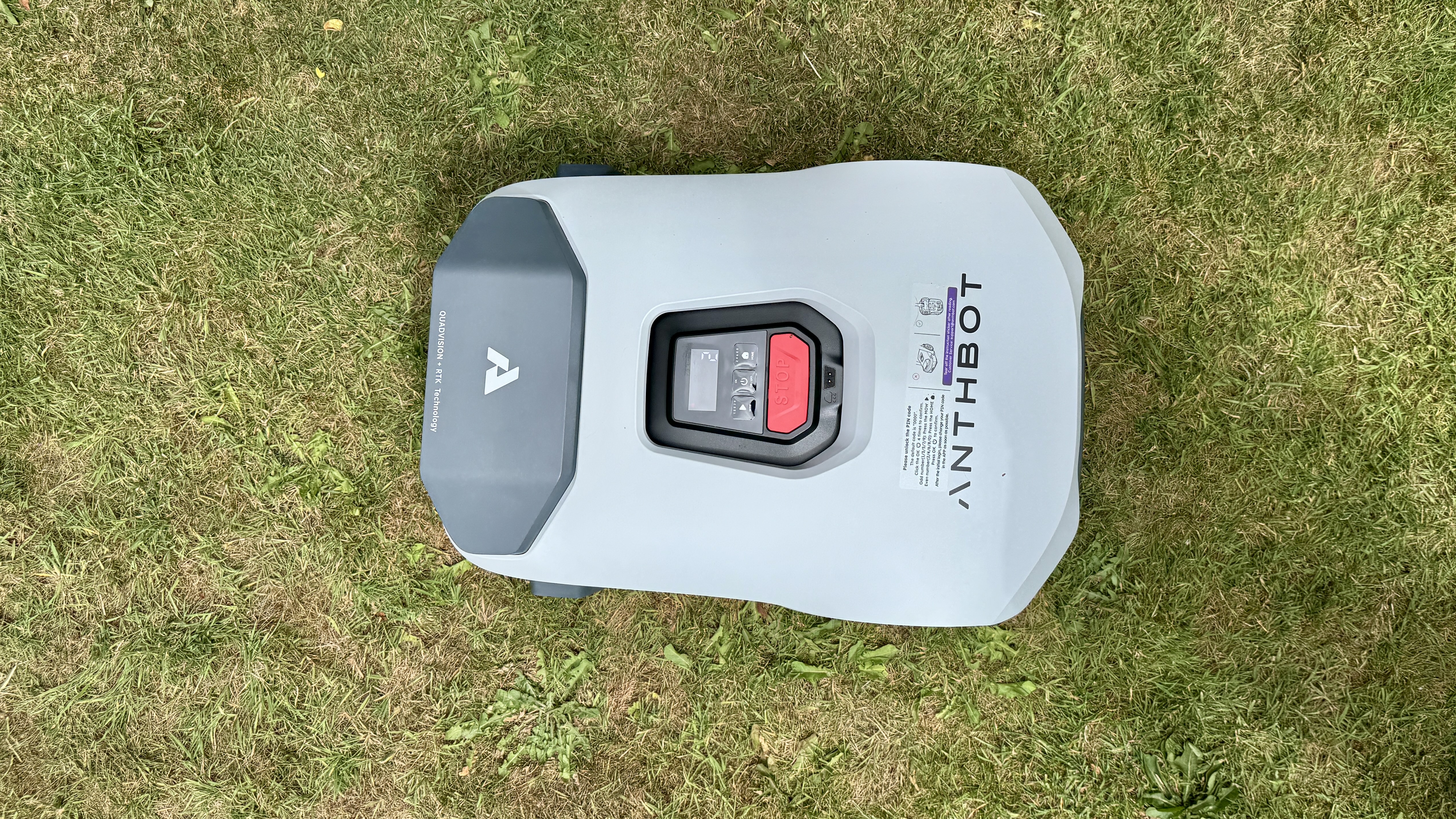 Anthbot Genie 300 robot lawn mower in reviewer's yard