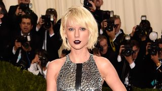 taylor swift on the red carpet with a bob hairstyle