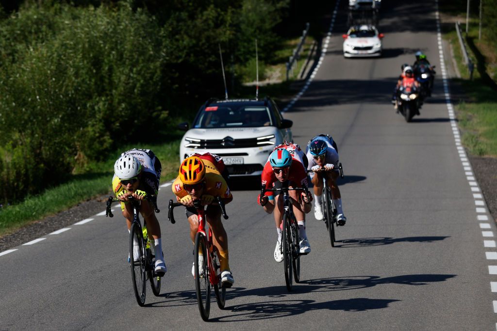 KRAKOW POLAND AUGUST 05 LR Julius Johansen of Denmark and Team Intermarch Wanty Gobert Matriaux Syver Westgaard Warsted of Norway and UNO X Pro Cycling Team Jarrad Drizners of Australia and Team Lotto Soudal and Alessandro De Marchi of Italy and Team Israel Premier Tech compete in the breakaway during the 79th Tour de Pologne 2022 Stage 7 a 1778km stage from Valsir to Krakow TdP22 WorldTour on August 05 2022 in Krakow Poland Photo by Bas CzerwinskiGetty Images