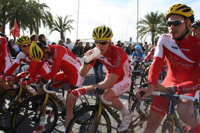 The Cofidis team line up on the seafront in Palma, Mallorca