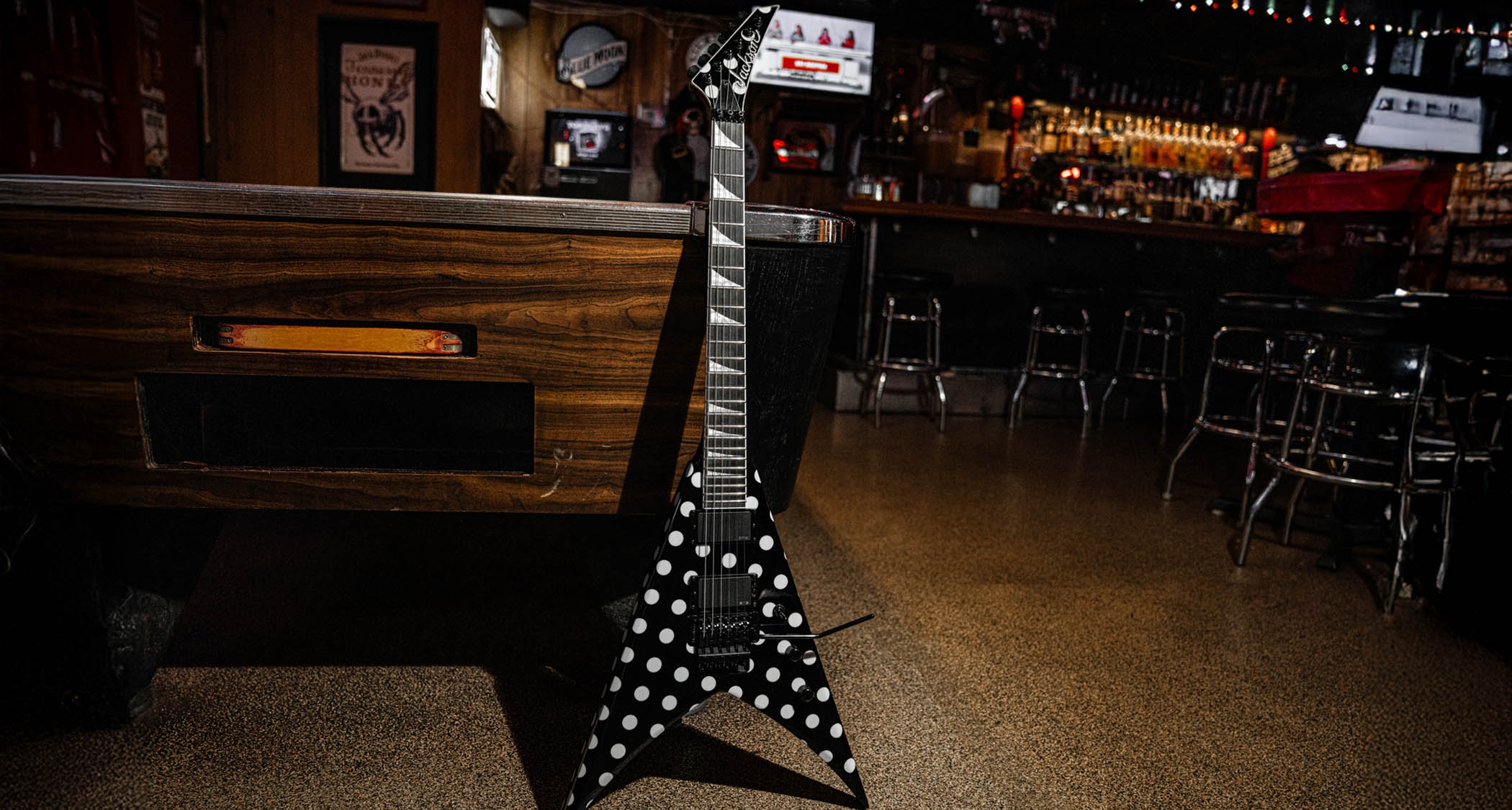Jackson Pro Series Limited Edition Phil Demmel KV King V: the V-style electric is finished in black-and-white polka dots, and looks good in all settings, against a white background or barroom scene alike.