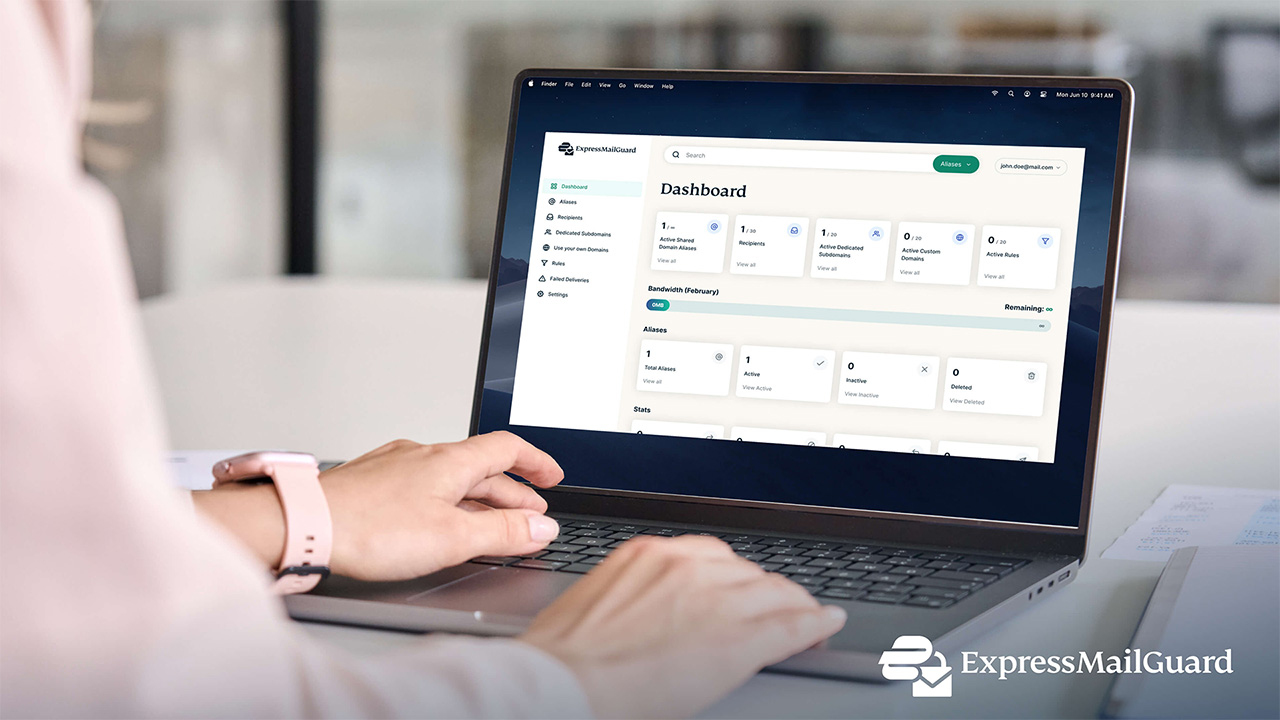 Person navigating the ExpressMailGuard dashboard on a laptop