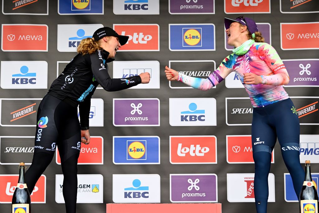 WEVELGEM BELGIUM MARCH 26 LR The second classified Megan Jastrab of The United States and Team DSM and third classified Maike Van Der Duin of The Netherlands and Team CanyonSRAM Racing congratulate each other at podium during the 12th GentWevelgem In Flanders Fields 2023 Womens Elite a 1625km one day race from Ypres to Wevelgem UCIWWT on March 26 2023 in Wevelgem Belgium Photo by Luc ClaessenGetty Images