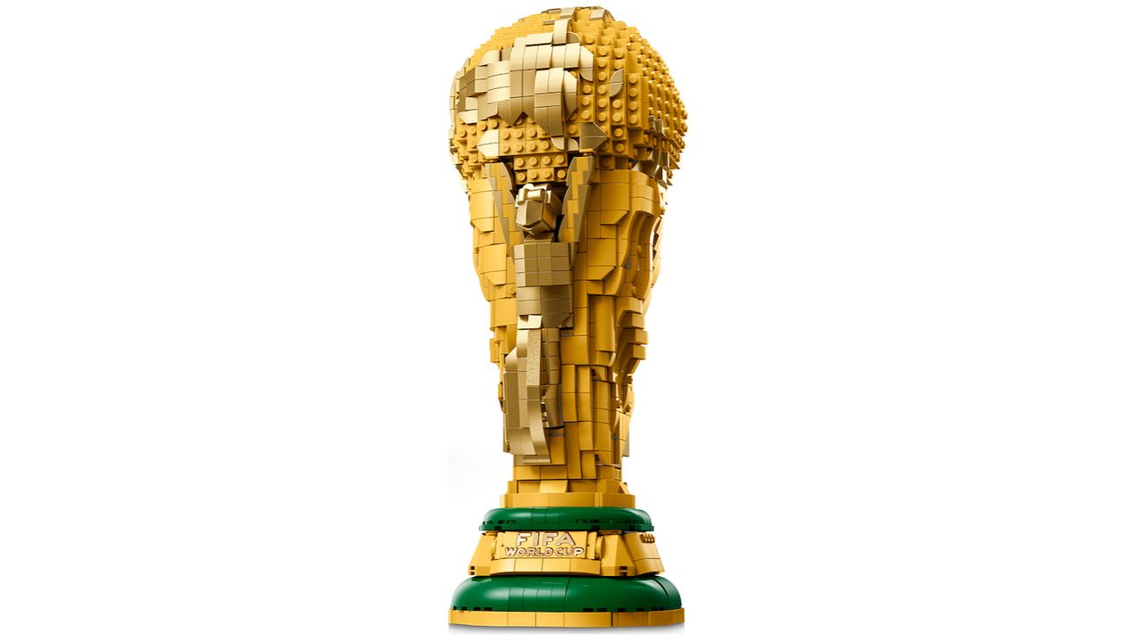 A Lego version of the world cup trophy on a white background