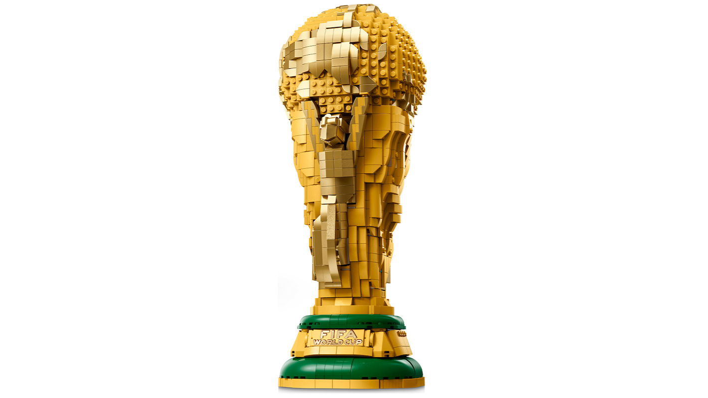 A Lego version of the world cup trophy on a white background