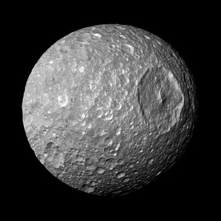 Saturn's Death Star moon Mimas only looks like a fully operational battle station. But this rocky Saturnian satellite is merely a battered moon and one of the most intriguing objects in the solar system.