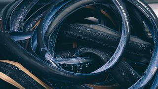 A close up of a pile of tyres