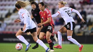 Sofie Lundgaard of Liverpool Women challenges for the ball during the Women's League Cup match between Manchester United and Liverpool at Leigh Sports Village on October 02, 2024 in Leigh, England.