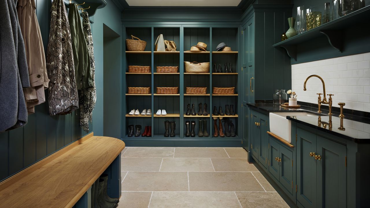 Dark green boot room design by Martin Moore