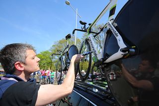 The UCI uses its special tablet to check bikes for mechanical doping during the Giro's opening stage.