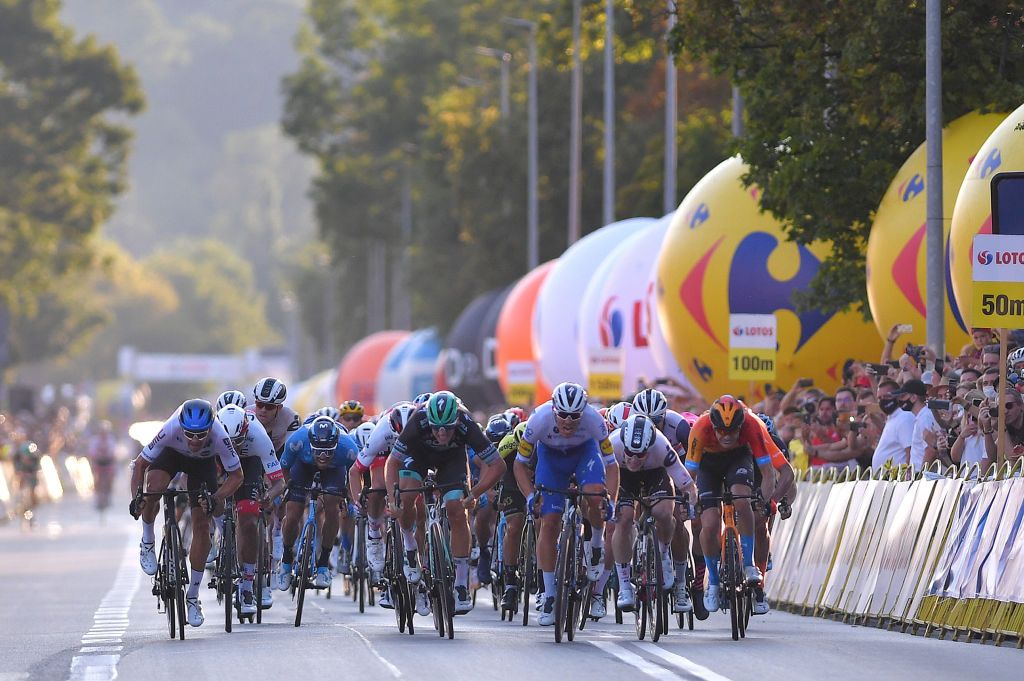 KRAKOW POLAND AUGUST 09 Arrival Sprint Ryan Gibbons of South Africa and NTT Pro Cycling Team Pascal Ackermann of Germany and Team Bora Hansgrohe Davide Ballerini of Italy and Team Deceuninck QuickStep Alberto Dainese of Italy and Team Sunweb during the 77th Tour of Poland 2020 Stage 5 a 188km stage from Zakopane to Krakow TourdePologne tdp20 on August 09 2020 in Krakow Poland Photo by Luc ClaessenGetty Images