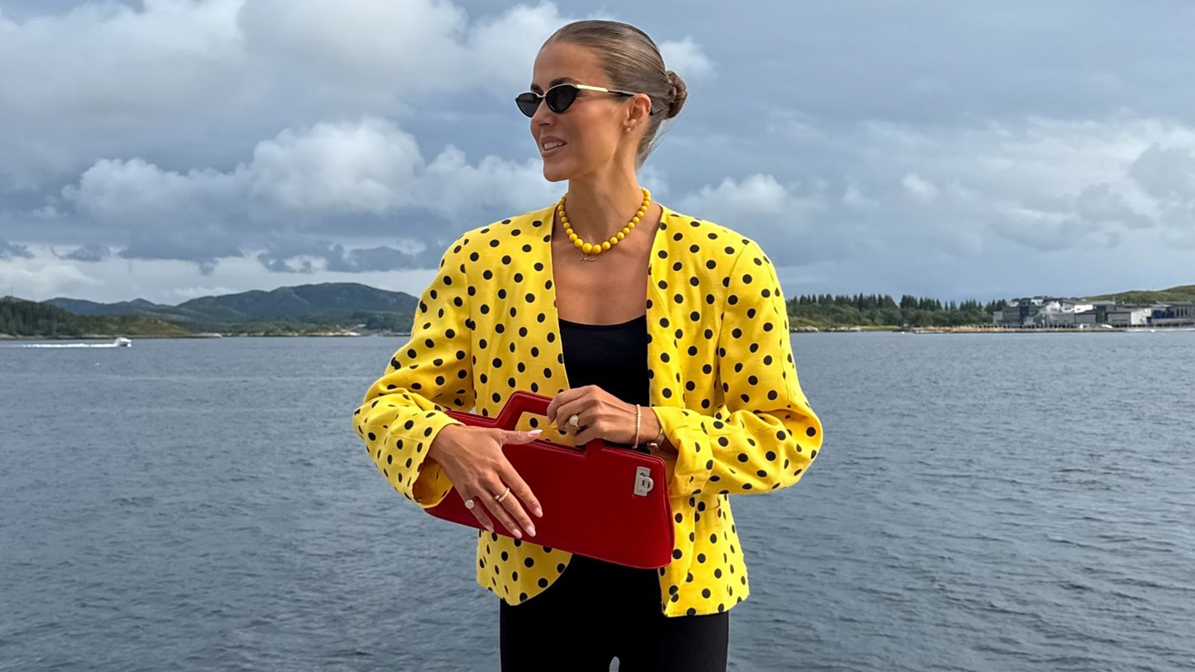 Nina Sandbech wearing a red bag.