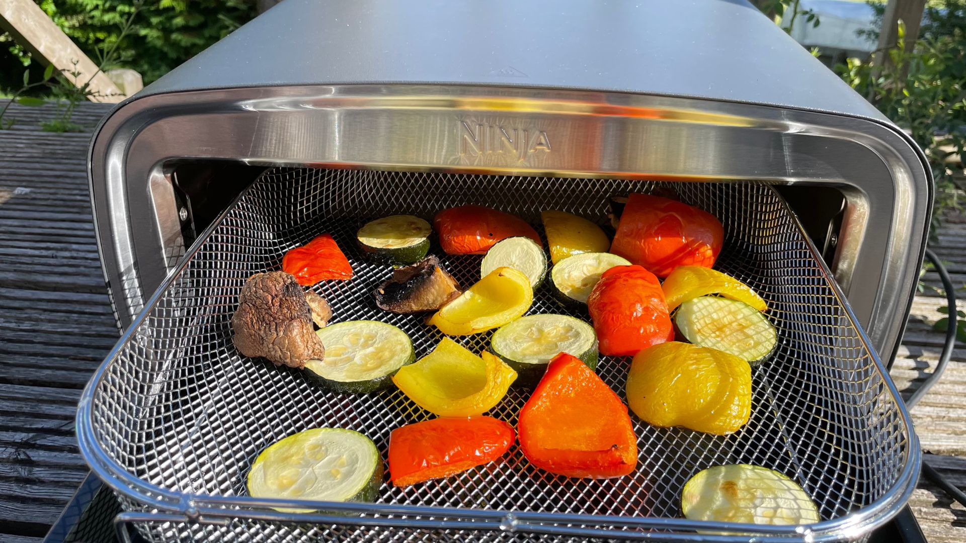 Vegetables cooked in the Ninja Artisan Electric Outdoor Pizza Oven and Air Fryer