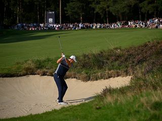 Padraig Harrington hitting a long bunker shot at the BMW Championship