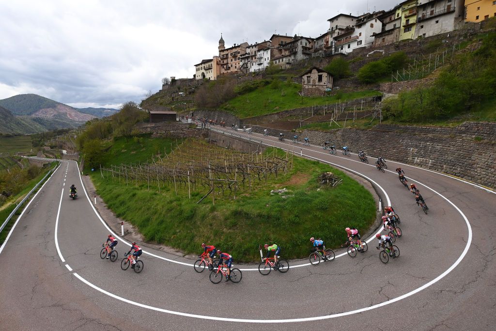 PREDAZZO ITALY APRIL 20 Tao Geoghegan Hart of United Kingdom and Team INEOS Grenadiers Green Leader Jersey Alexander Cepeda of Ecuador and Team EF EducationEasypost Blue Mountain Jersey and a general view of the peloton passing through Cembra Village 665m during the 46th Tour of the Alps 2023 Stage 4 a 1529km stage from Rovereto to Predazzo 1023m on April 20 2023 in Predazzo Italy Photo by Tim de WaeleGetty Images