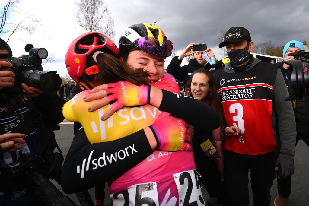 OUDENAARDE BELGIUM APRIL 03 Race winner Lotte Kopecky of Belgium celebrates the victory with her teammate Chantal Van Den Broek Blaak of Netherlands and Team SD Worx during the 19th Ronde van Vlaanderen Tour des Flandres 2022 Womens Elite a 1586km one day race from Oudenaarde to Oudenaarde RVV22 RVVwomen on April 03 2022 in Oudenaarde Belgium Photo by Tim de WaeleGetty Images