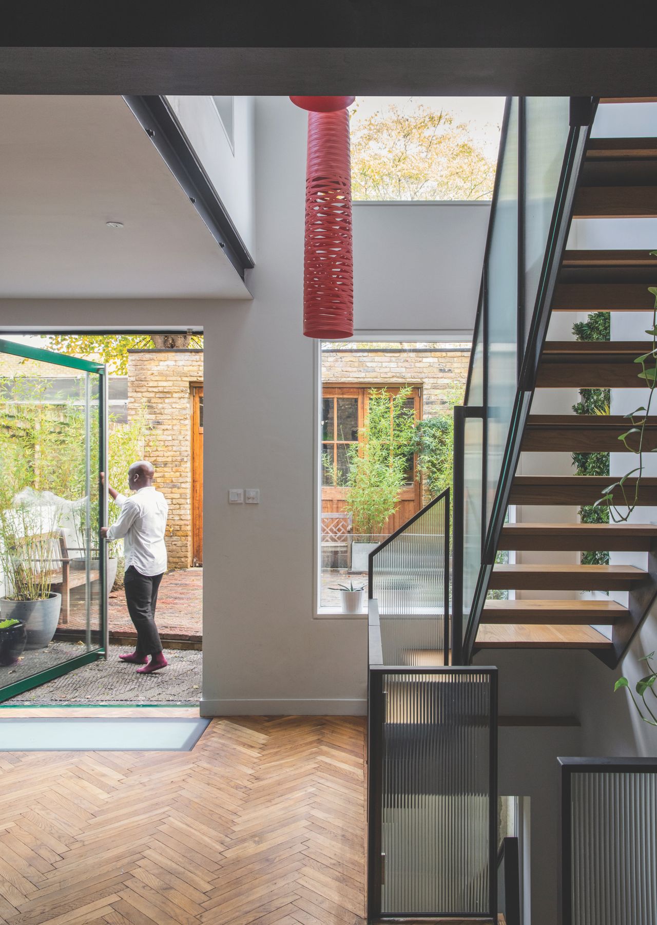 new staircase in remodelled terrace house with lots of glazing