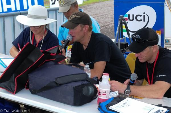 Announcers tracking rider's results