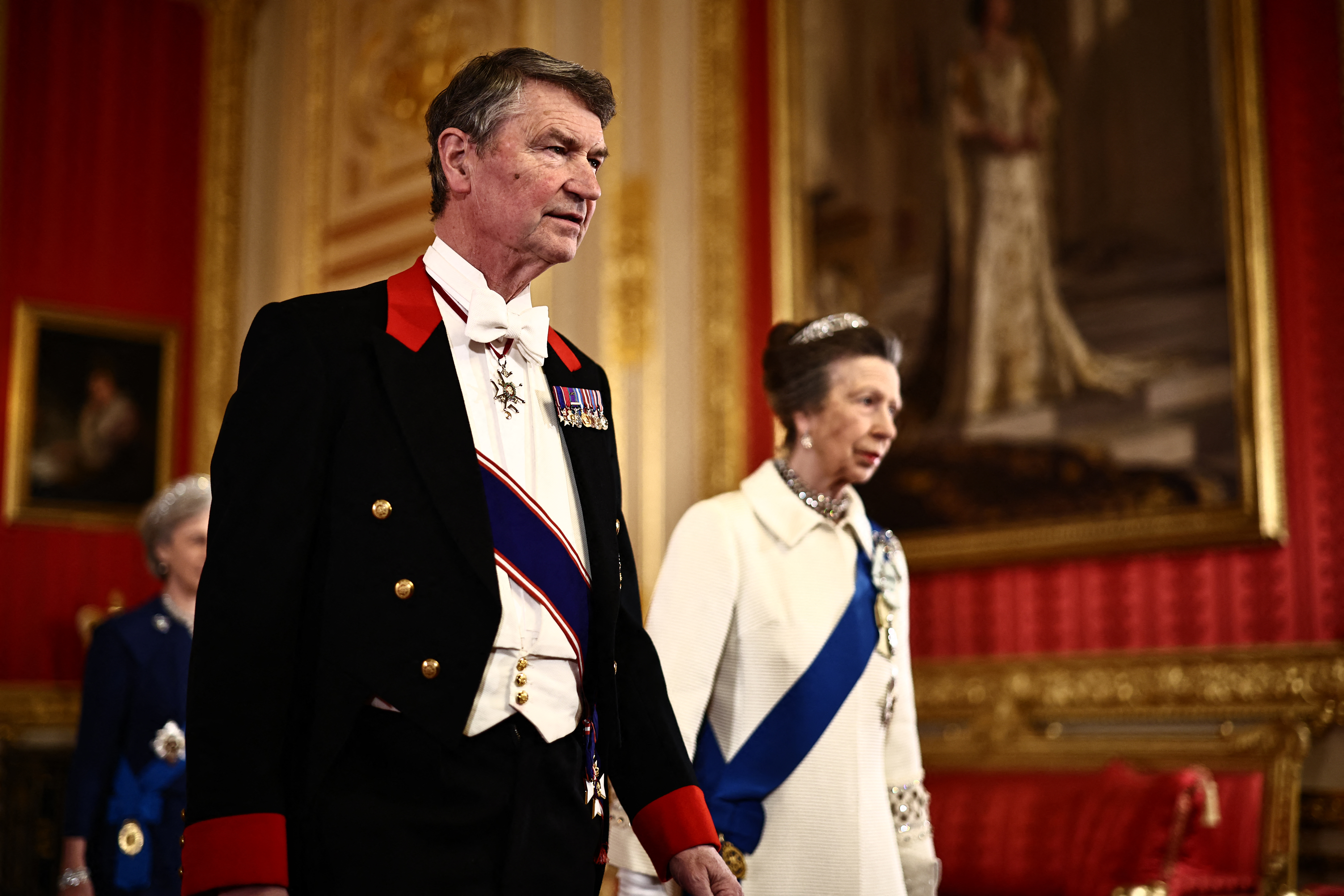 Princess Anne walking with Sir Tim Laurence at the Nigerian state banquet