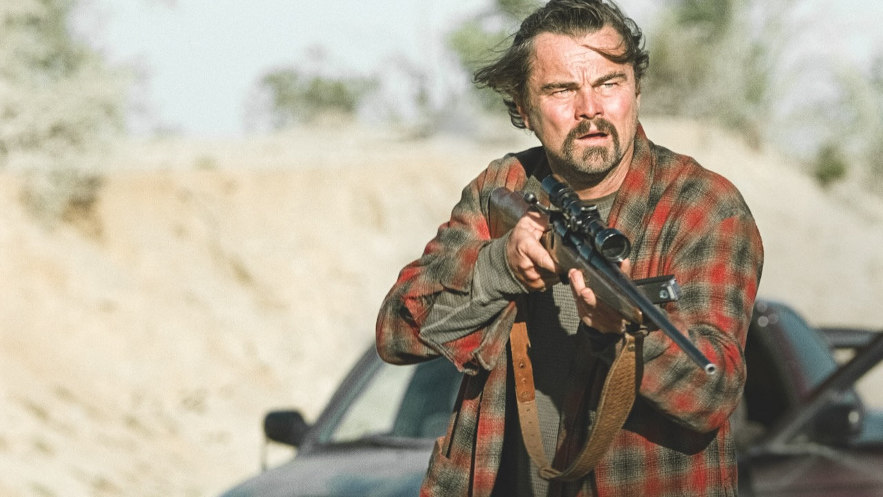 Leonardo DiCaprio&#039;s Bob wielding a rifle in One Battle After Another