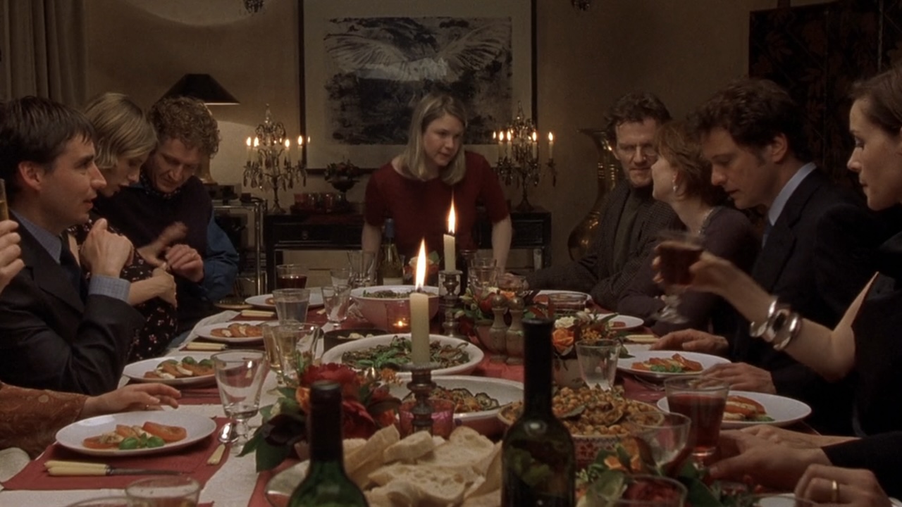 Bridget at the head of a dinner table in Bridget Jones's Diary