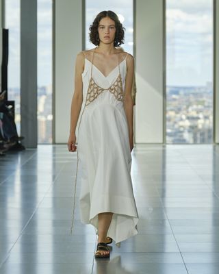 Model on the runway at London Fashion Week S/S 2023 wearing Rejina Pyo