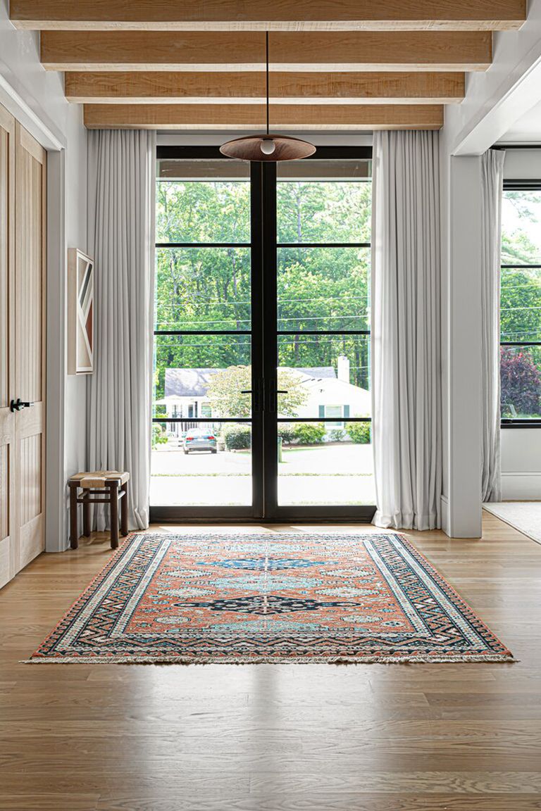 Should Curtains Touch the Floor? What Interior Designers do Livingetc