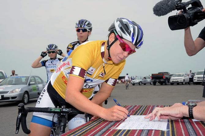 Race leader Chloe Hosking (Hitec Products UCK) signs on for stage 3 in Qatar.