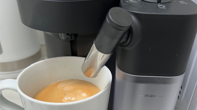 Using the Nespresso Vertuo Lattissima machine to create a frothy coffee