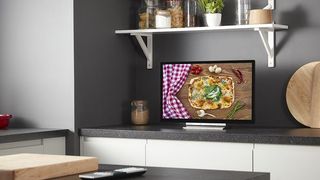 32-inch Toshiba WK3C smart TV on kitchen counter, showing recipe