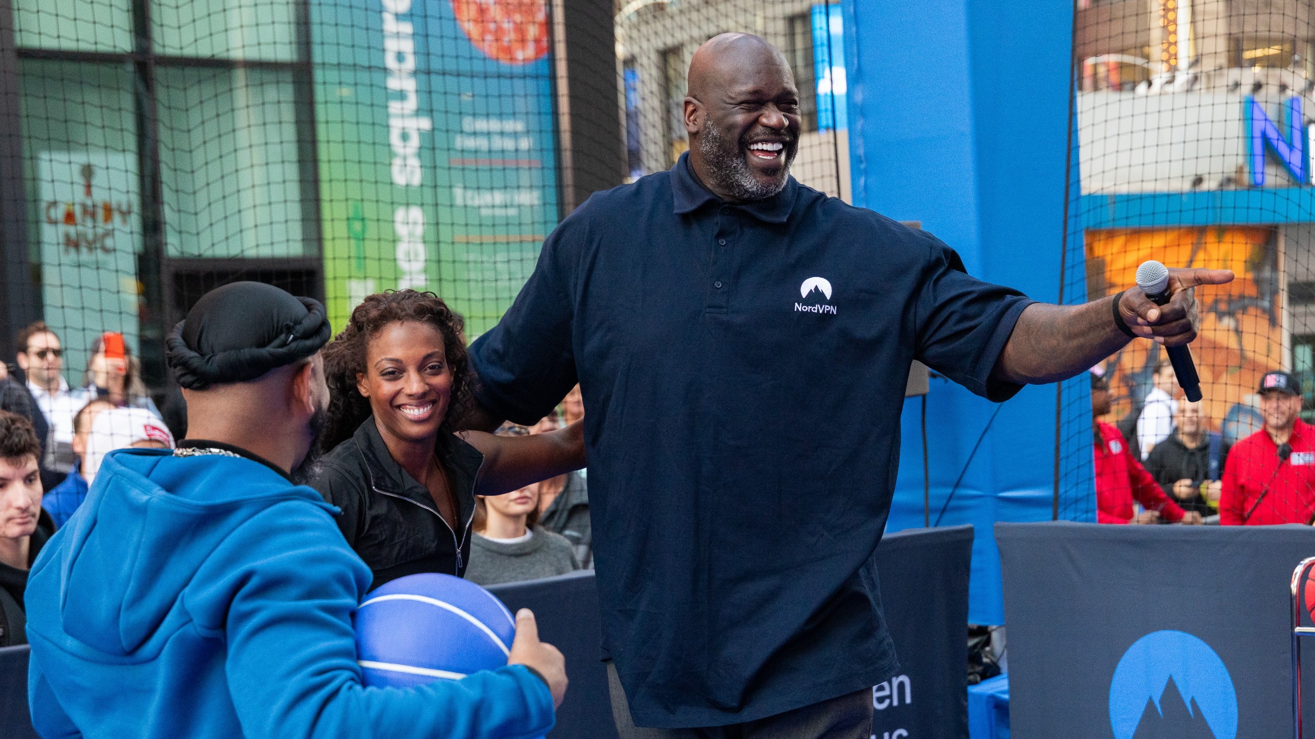 NBA Legend Shaquille O Neal in a NordVPN attire on a basketball court