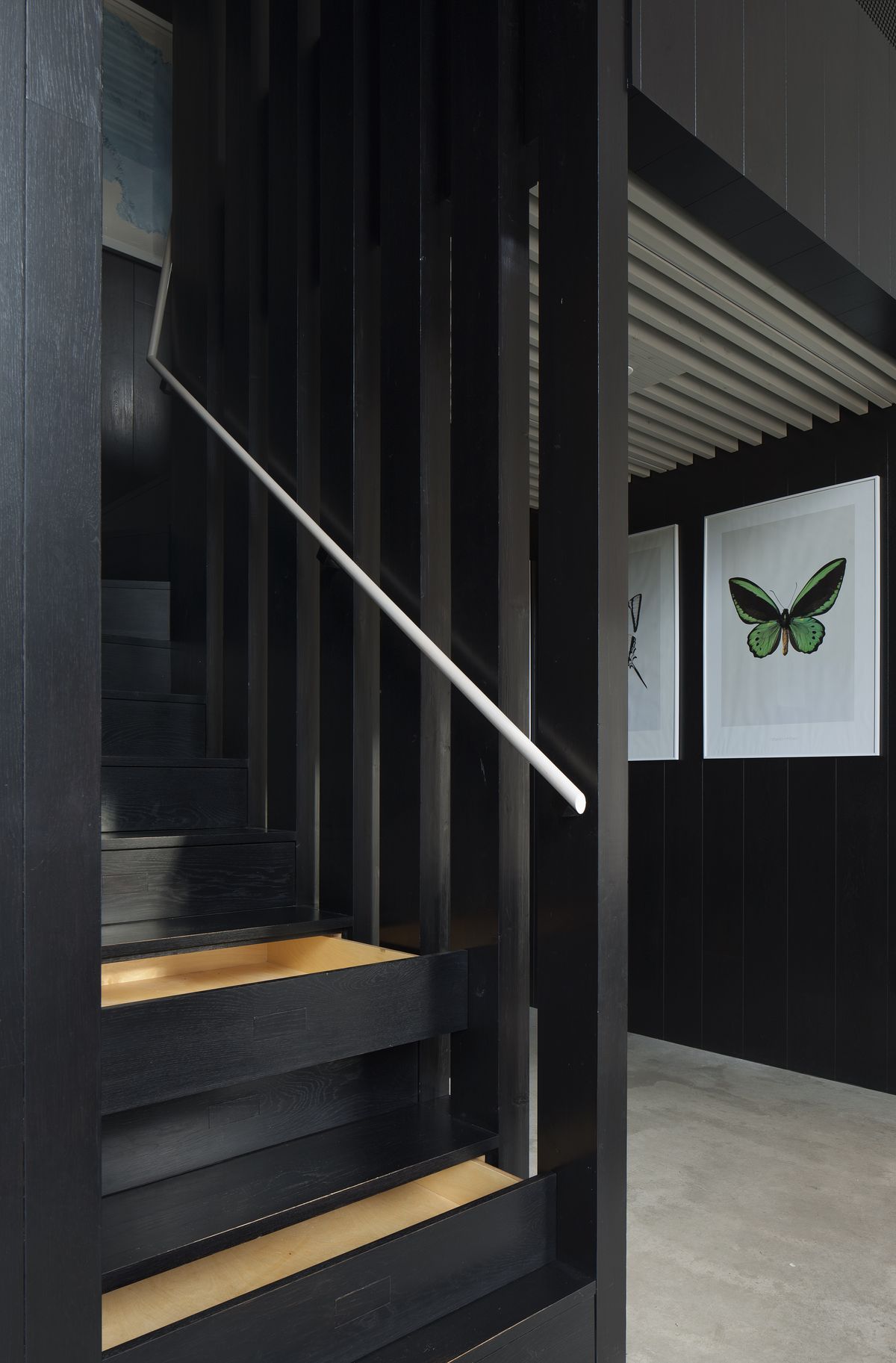 black timber staircase in self build home
