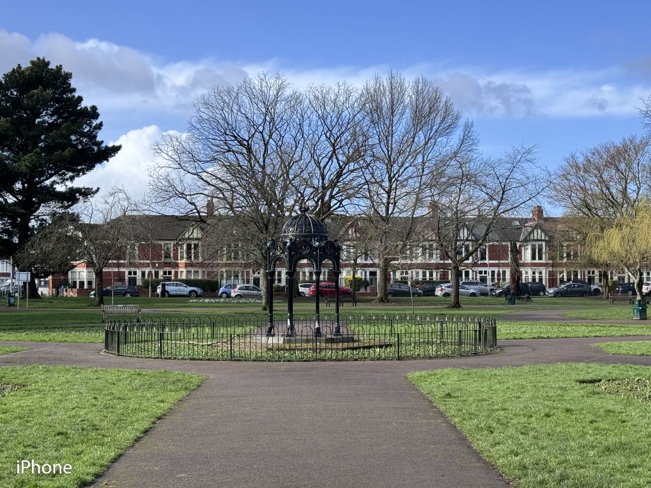 A photo of a park on a sunny day, taken on an iPhone 15 Pro