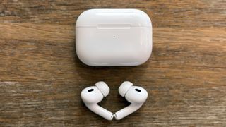 The AirPods Pro 2 on a table with case