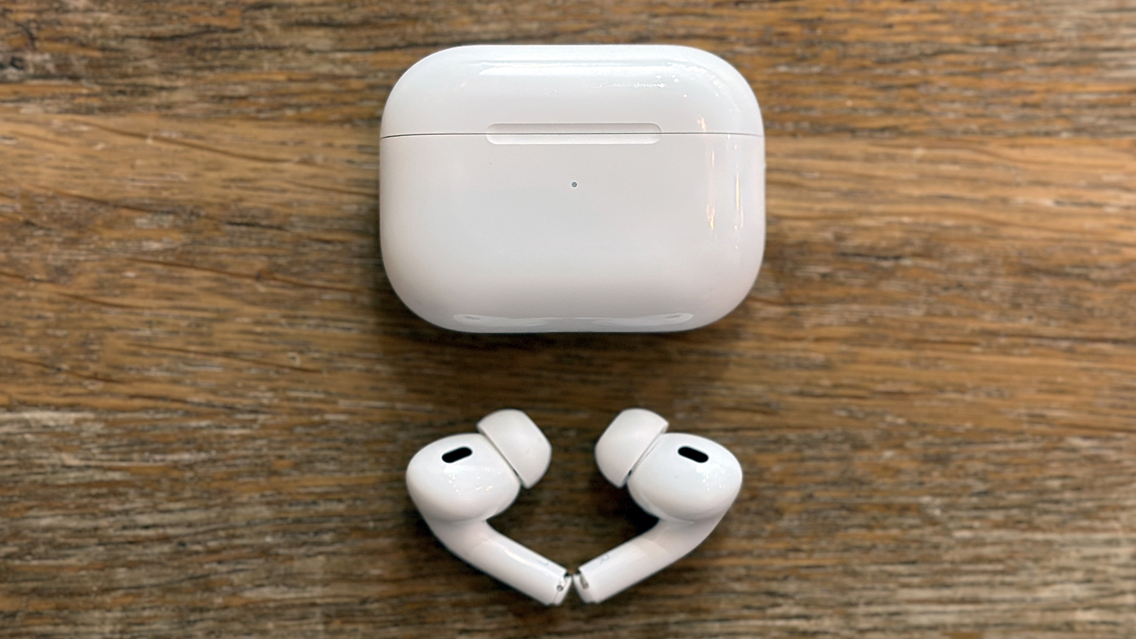 AirPods Pro 2 on a table with case