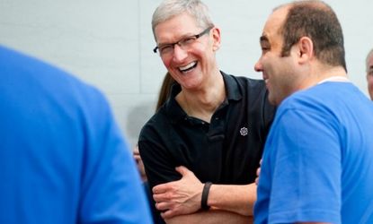 Apple CEO Tim Cook is wearing what appears to be Nike's best-selling fitness bracelet the FuelBand. Inspiration, perhaps?