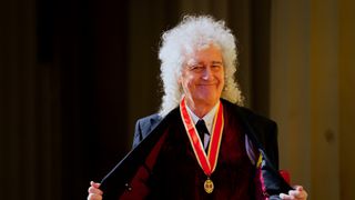 Sir Brian May after being made a Knight Bachelor for services to music and charity by King Charles III during an investiture ceremony at Buckingham Palace on March 14, 2023 in London, England.
