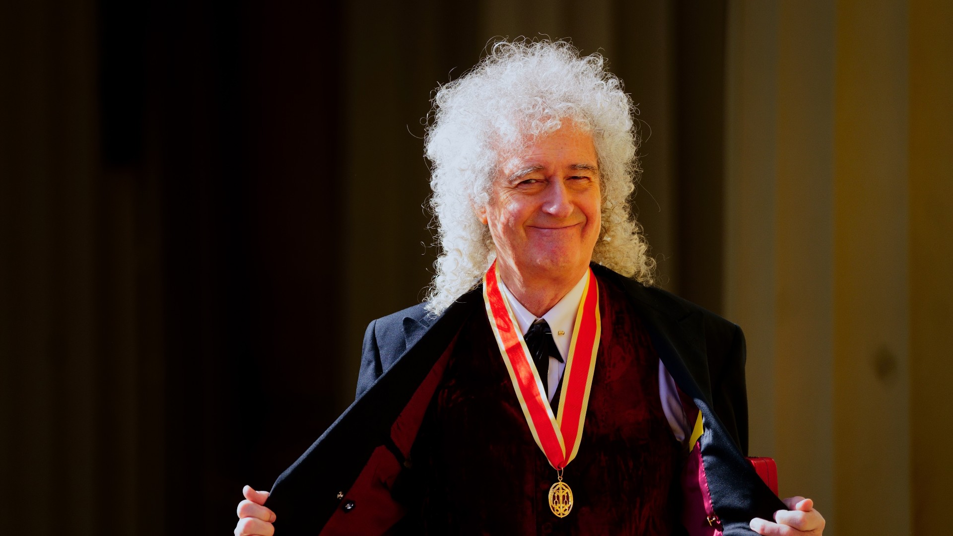 : Sir Brian May after being made a Knight Bachelor for services to music and charity by King Charles III during an investiture ceremony at Buckingham Palace on March 14, 2023 in London, England.