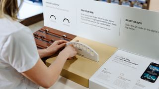 a photo showing the "Find your size" station at the Oura Rings area at best buy