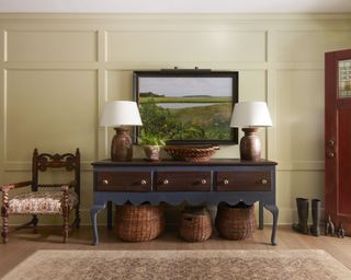 entryway with beige panelled wall, rustic and traditional furniture