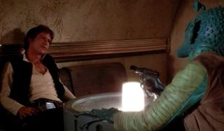 Star Wars Greedo aims his gun at Han in the cantina