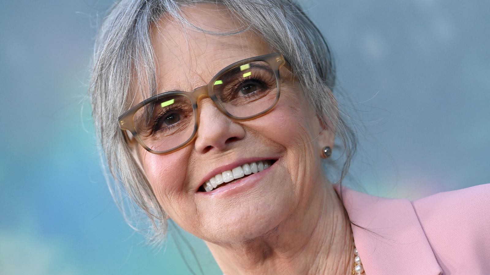 sally field on a blue background
