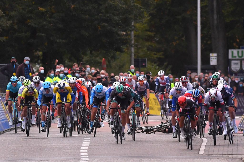 SCHOTEN BELGIUM OCTOBER 14 Sprint Arrival Caleb Ewan of Australia and Team Lotto Soudal Pascal Ackermann of Germany and Team Bora Hansgrohe Niccolo Bonifazio of Italy and Team Total Direct Energie Bryan Coquard of France and Team BB Hotels Vital Concept Tim Merlier of Belgium and Team AlpecinFenix Jasper Philipsen of Belgium and UAE Team Emirates Amaury Capiot of Belgium and Team Sport Vlaanderen Baloise Arvid De Kleijn of Netherlands and Team Riwal Securitas Sam Bennett of Ireland and Team Deceuninck QuickStep Itamar Einhorn of Israel and Team Israel StartUp Nation Crash during the 108th Scheldeprijs 2020 a 1733km stage from Schoten to Schoten Scheldeprijs FlandersClassic SP20 on October 14 2020 in Schoten Belgium Photo by Luc ClaessenGetty Images