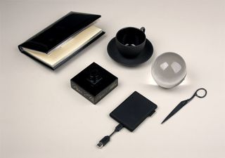 Black gloss notebook, Tea cup and saucer, part of the ‘Black Basalt Tea Set’ collection