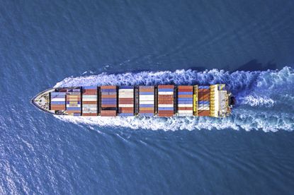 Shipping industry aerial view of container ship in sea
