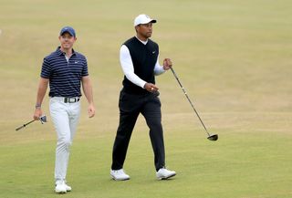 Rory McIlroy and Tiger Woods walking down the fairway