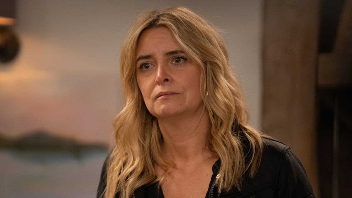 Emmerdale Charity Dingle looking sad wearing a black top and her hair down