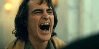 Joaquin Phoenix laughing in Joker