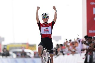 JEBEL HAFEET UNITED ARAB EMIRATES FEBRUARY 23 Tadej Pogacar of Slovenia and UAE Team Emirates Red Leader Jersey celebrates at finish line as stage winner during the 7th UAE Tour Stage 7 a 176km stage from Al Ain Hazza Bin Zayed Stadium to Jebel Hafeet 1031m UCIWWT on February 23 2025 in Jebel Hafeet United Arab Emirates Photo by Dario BelingheriGetty Images